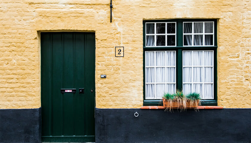 front view of a building with a black door
