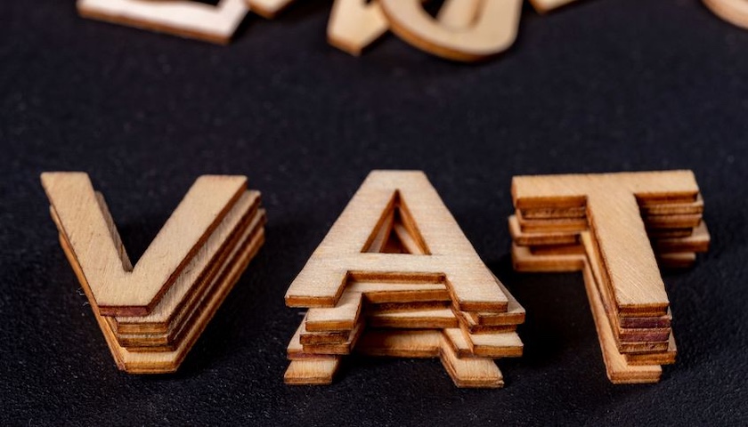 Wooden letters spelling out the word VAT - to accompany an article on understanding the UK VAT threshold
