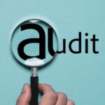What is a qualified audit opinion?