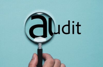 What is a qualified audit opinion?