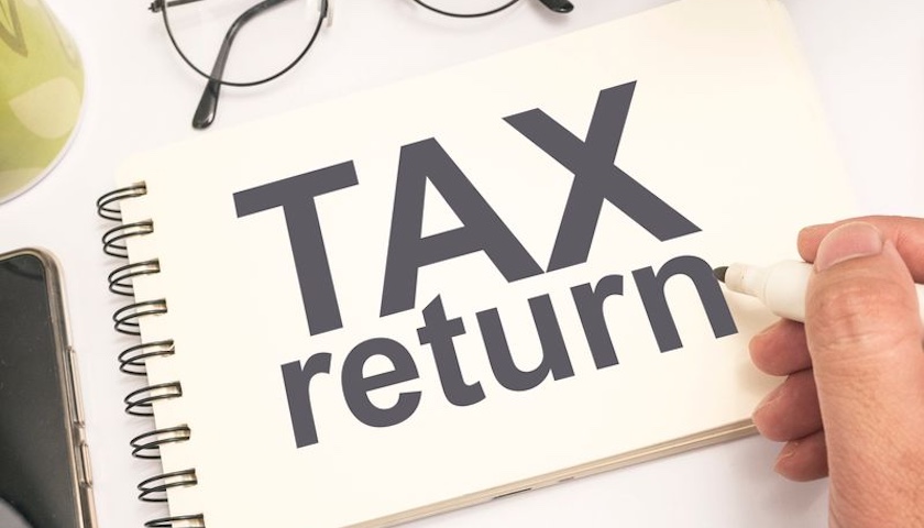 A writing pad with the words TAX RETURN on it - illustrating an article for people who want to know how to reduce a payment on account.