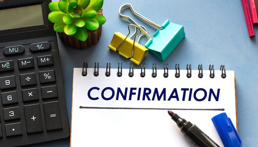 Image of the word 'confirmation' on a notebook, illustrating an article on what a Companies House confirmation statement is