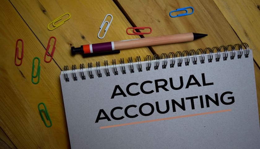 An image of the words 'Accrual Accountint' written on a notepad, illustrating an article on Accruals and Prepayments